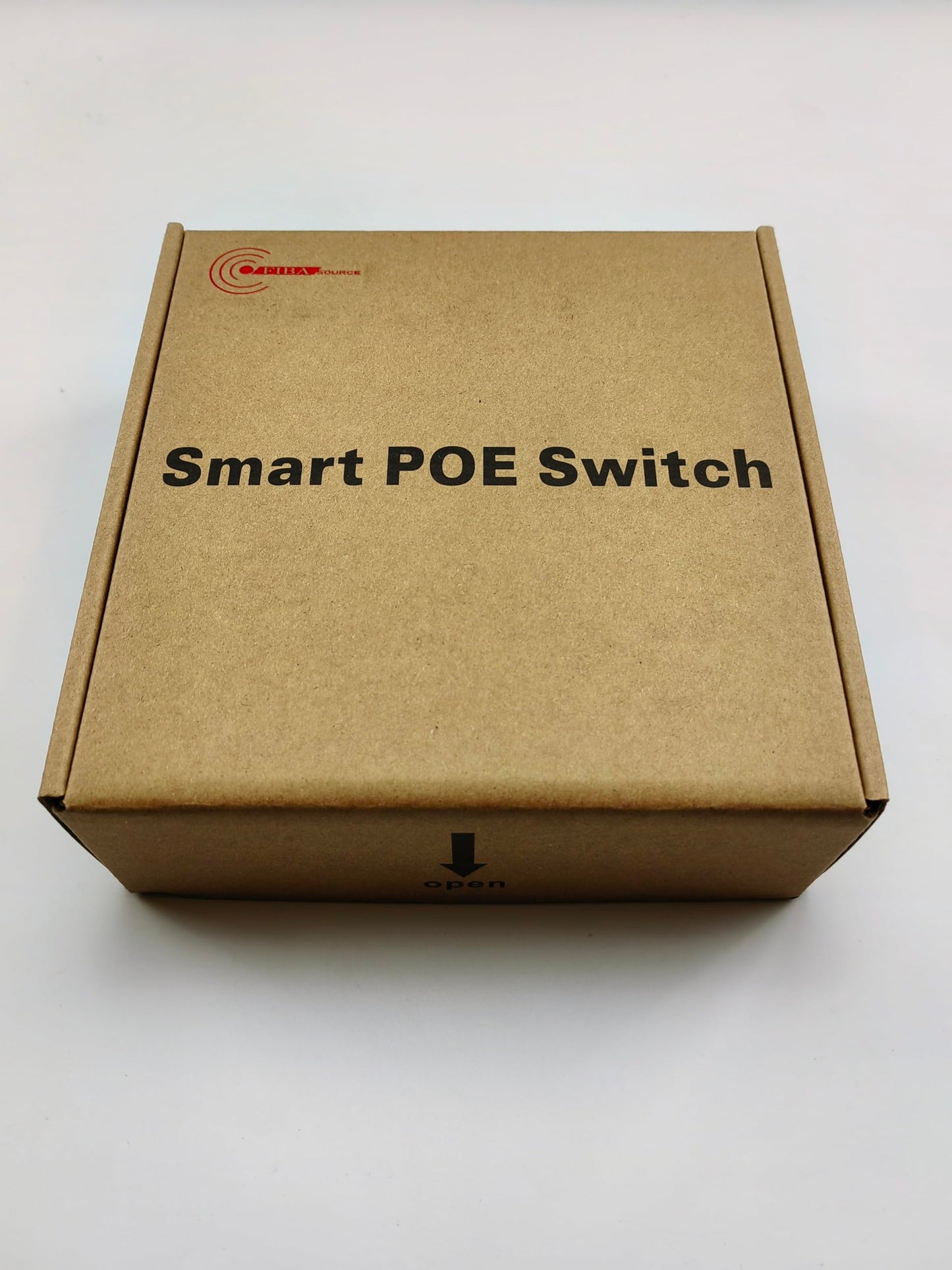 A cardboard box labeled with "5 Port Smart POE Switch, 10/100/1000, BT04G-4+1GE" from FIBAsource Ltd features an arrow pointing down and the word "open" at the bottom. Emphasizing its advanced functionality, this packaging promises high-speed Ethernet switching with RJ45 ports. Set against a plain white background, it invites you to discover its potential.