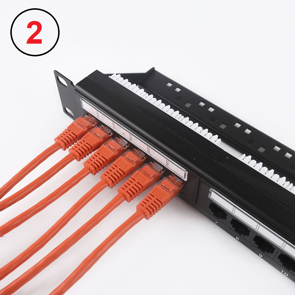 An image features a black Cat 6 24 Port Patch Panel by FIBAsource Ltd with inline keystone options, supporting 10G speeds. Several orange Ethernet cables connect to the panel, which rests on a white surface. A red circle with the number 2 is positioned in the top left corner.