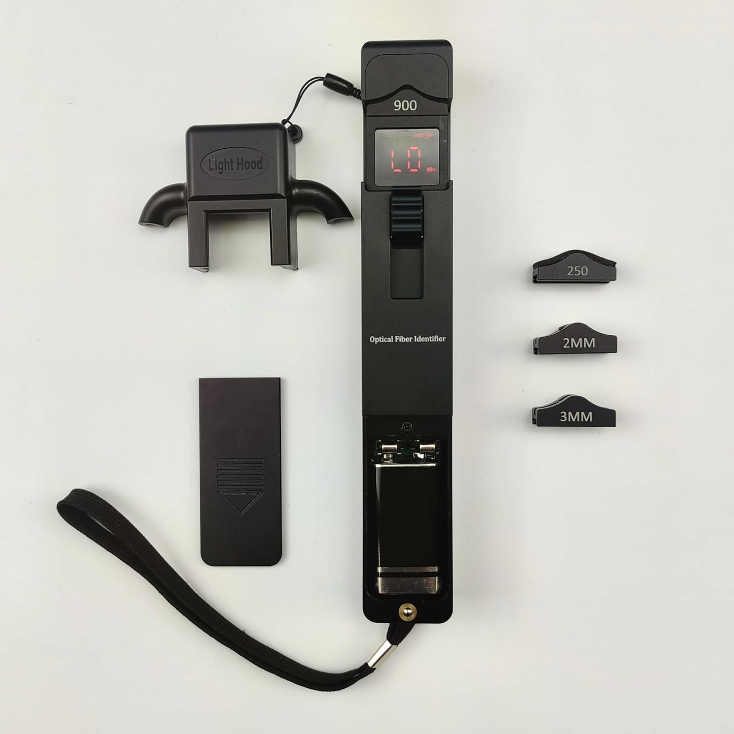 A FIBAsource Ltd Portable Optical Fibre Identifier Live Fibre Optic Cable Tester, featuring a black design with a digital display reading 0.0, is equipped with interchangeable heads marked 250, 2MM, and 3MM for diverse fiber network testing needs. It includes a detachable light hood and wrist strap, all elegantly displayed on a light surface.
