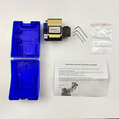 Displayed on a white background, the FIBAsource Ltd Fibre Optic Cleaver with 2x Options includes a durable blue plastic case, an instruction manual, and three hex keys. This precision cleaver tool set is specifically designed for optical fibre cleaving and features a metallic top with labels emphasizing its blade rotation capability for improved precision.