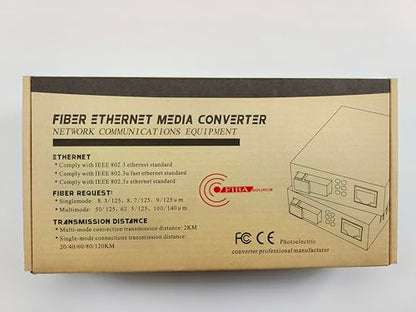 The cardboard box for the FIBAsource Ltd SFP Ethernet Media Converter with POE Function highlights specifications such as 100/1000Mbps transmission speeds, compliance with IEEE 802.3 Ethernet standards, fiber requirements, and low power dissipation. The packaging includes text and graphics associated with networking equipment.