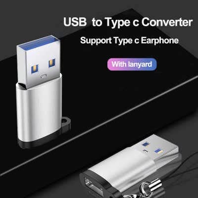 Presenting the FIBAsource Ltd USB 3.0 Male to Type C Female Adaptor with a sleek metallic finish and handy lanyard. This compact and portable adapter supports Type-C earphones and fast charging capabilities, perfectly highlighted against a black background.